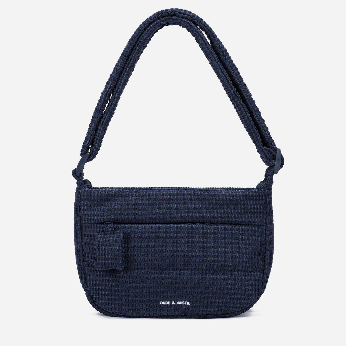 A dark navy blue woven Corduroy Puff shoulder bag by Dude & Bestie Winter 2026