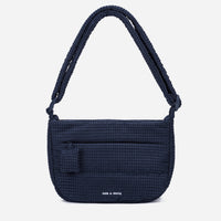A dark navy blue woven Corduroy Puff shoulder bag by Dude & Bestie Winter 2026