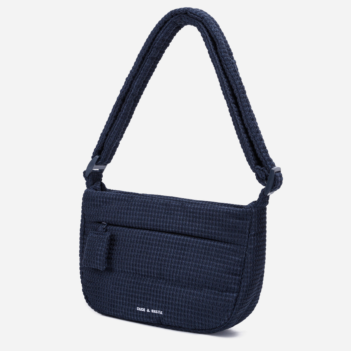 A dark navy blue woven Corduroy Puff shoulder bag by Dude & Bestie Winter 2026