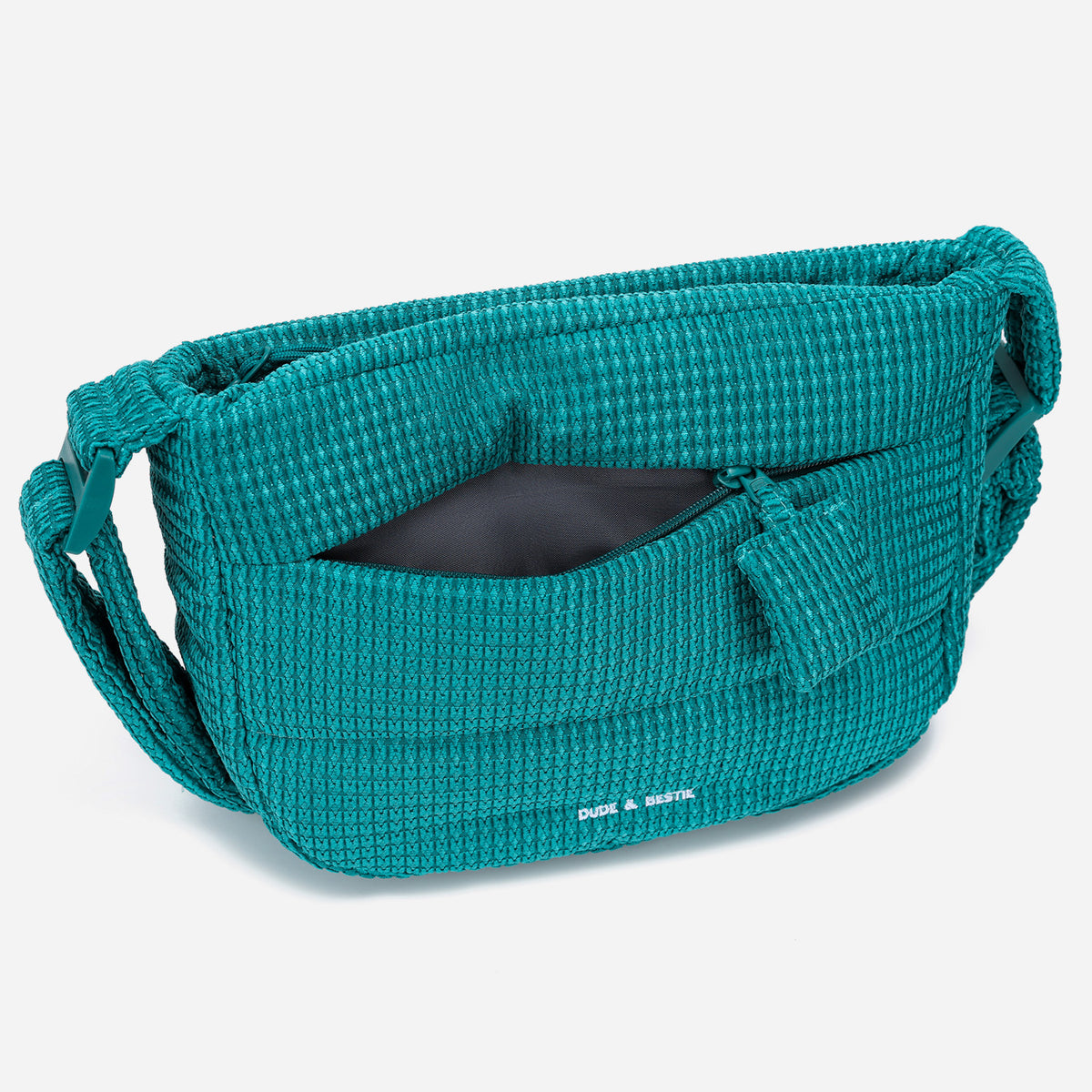 A teal color woven Corduroy Puff shoulder bag by Dude & Bestie Winter 2026