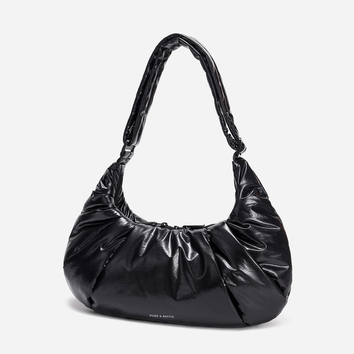 A black shiny Croissant-shaped shoulder bag with a single strap in polish black color