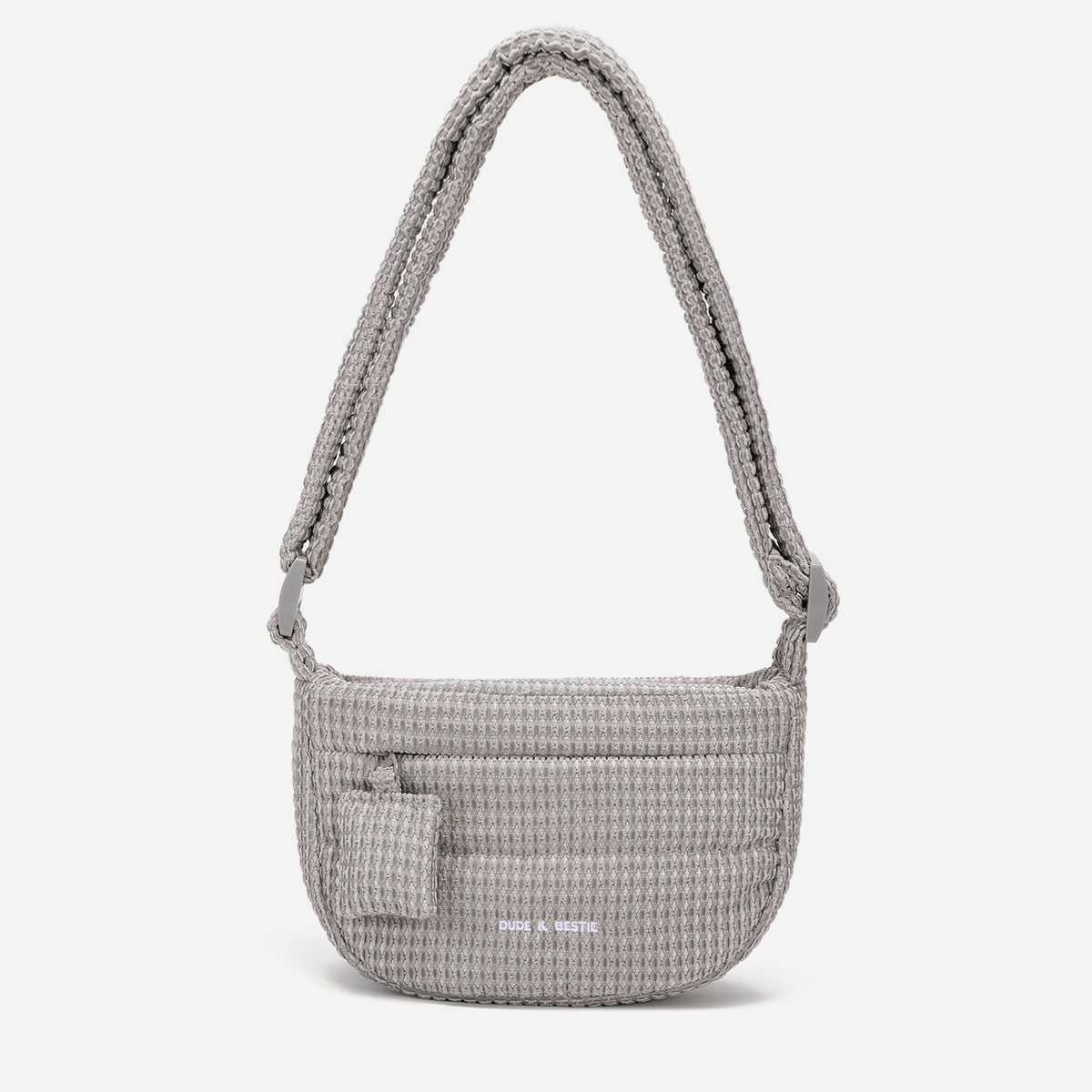 A light dove gray woven corduroy shoulder bag by Dude & Bestie Winter 2026 Series