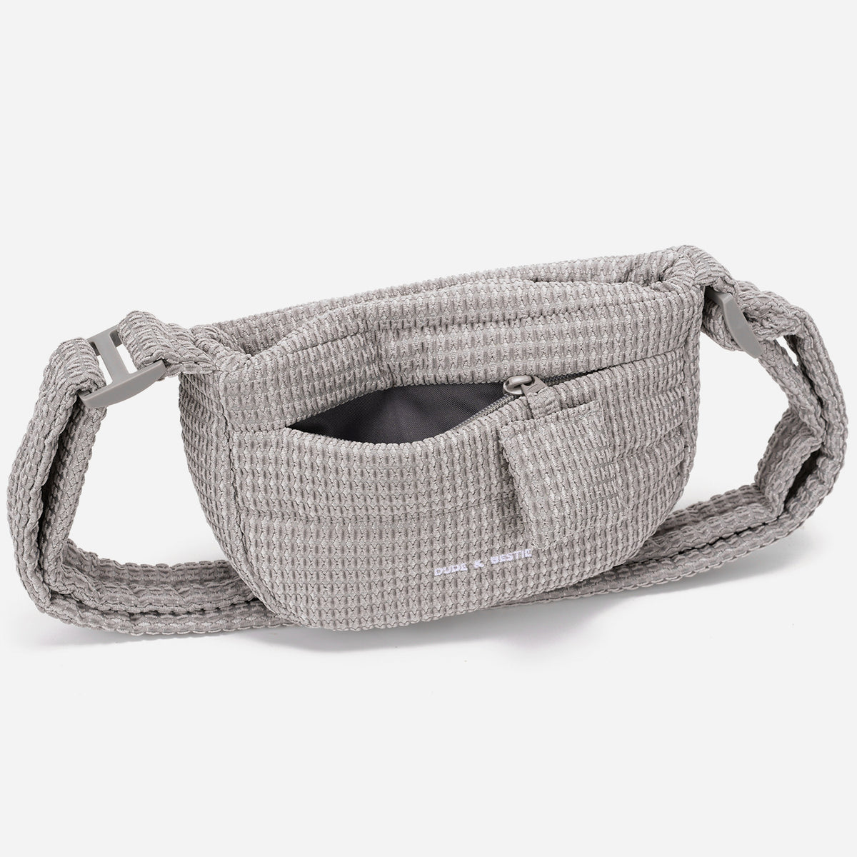 A light dove gray woven corduroy shoulder bag by Dude & Bestie Winter 2026 Series