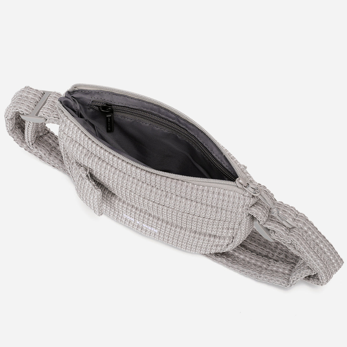 A light dove gray woven corduroy shoulder bag by Dude & Bestie Winter 2026 Series