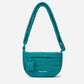 A teal woven corduroy shoulder bag by Dude & Bestie Winter 2026 Series