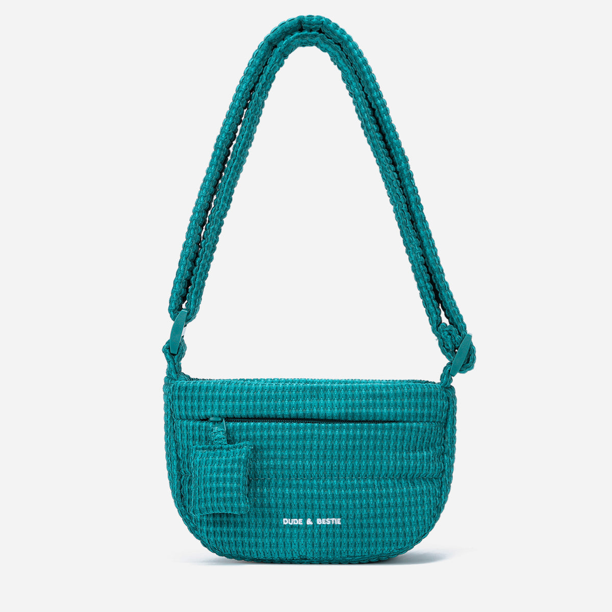 A teal woven corduroy shoulder bag by Dude & Bestie Winter 2026 Series